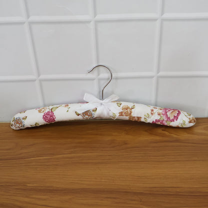 Wukusy premium padded floral clothes hanger with soft padding and floral design, ideal for delicate garments and closet organization.