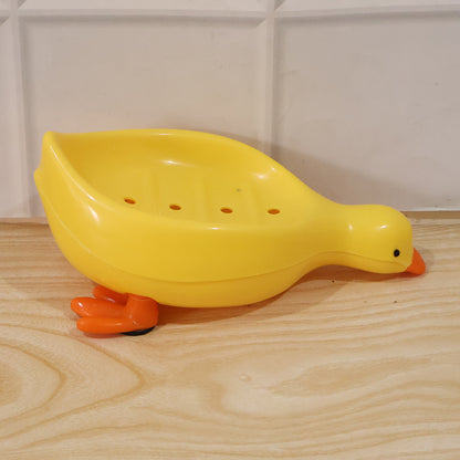 Cute duck-shaped plastic soap holder for bathroom, Wukusy kids soap dish tray with drainage slot, ideal for bathroom or kids' use.