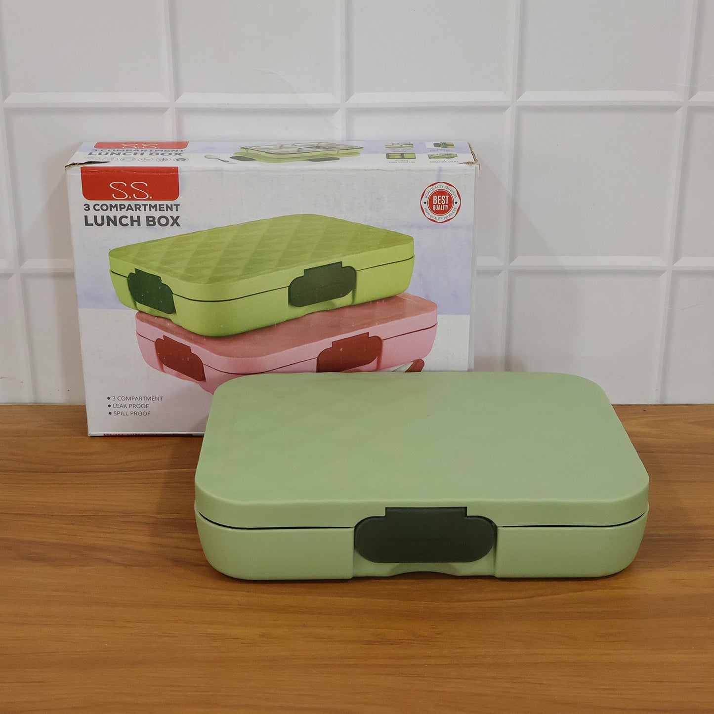 Wukusy Fresca stainless steel 3-compartment lunch box with secure lids, ideal for carrying meals and snacks.