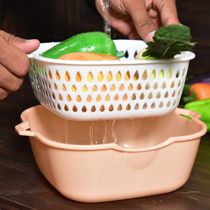 Wukusy 2-in-1 basket strainer for rinsing fruits, vegetables, and other items, with a mesh design for efficient cleaning.