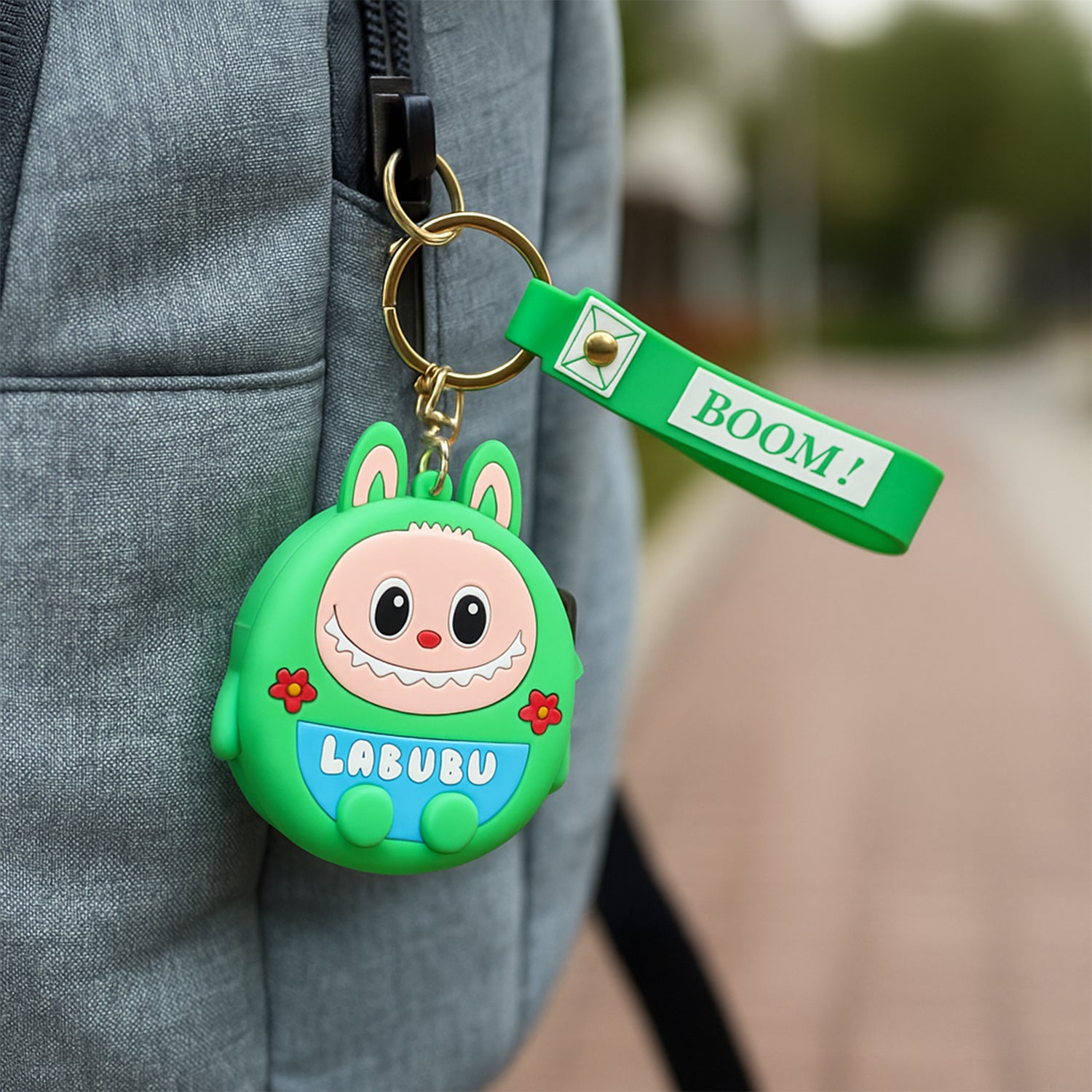 Cute cartoon character coin pouch with keychain and wrist strap, featuring colorful Wukusy design and soft fabric exterior.