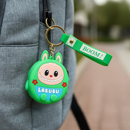 Cute cartoon character coin pouch with keychain and wrist strap, featuring colorful Wukusy design and soft fabric exterior.