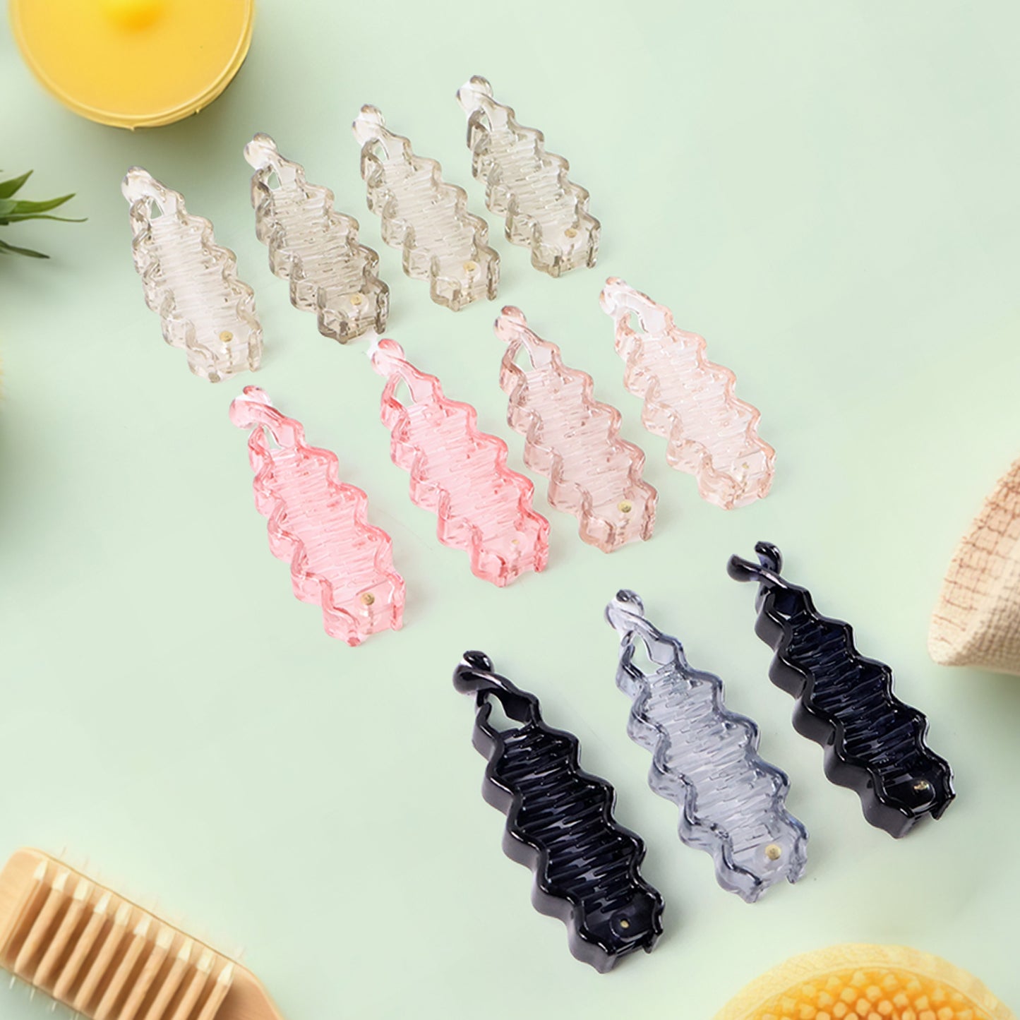 Set of 12 Wukusy plastic hair claw clips in mixed colors, strong and durable hair accessories for styling and securing hair.