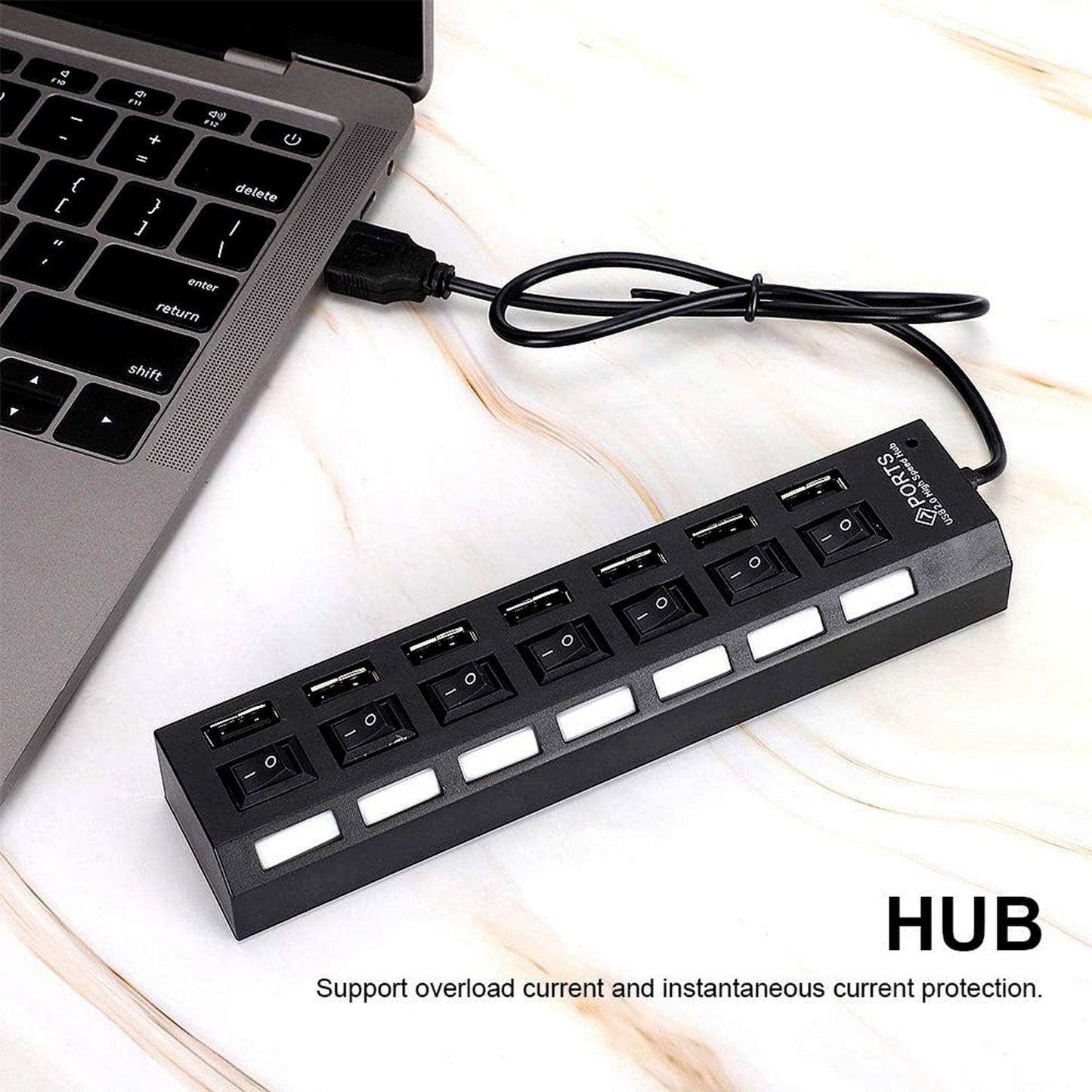 Wukusy 7-port USB 2.0 splitter hub with independent on/off switches, LED indicators, connected to a PC with various devices.