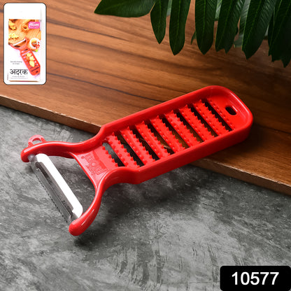 Wukusy Supermom ginger grater and peeler in a kitchen setting, showing the compact handheld tool for grating and peeling ginger.