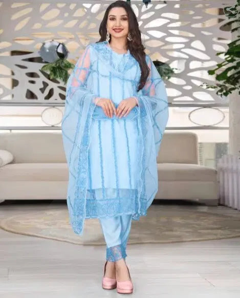 Women’s Kurta set with matching dupatta and bottomwear, featuring traditional design and vibrant fabric from 15801 brand.