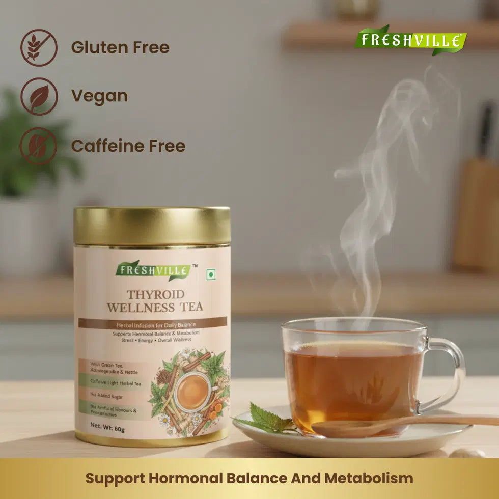Freshville Thyroid Wellness Tea in a ceramic tea pot, with a cozy setting and fresh herbs, perfect for herbal tea lovers.
