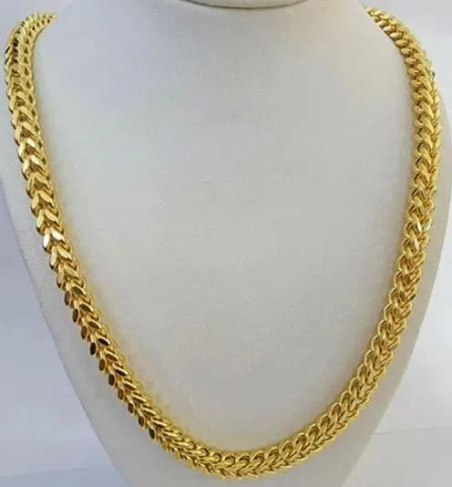 Heavy gold-plated Cuban link chain for men and boys, showcasing thick, shiny chain links on a men's jewelry display.