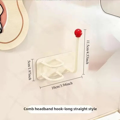 Self-adhesive wall-mounted hook for hair accessories, no drill needed, from brand 19357, ideal for organizing headbands and hair accessories.