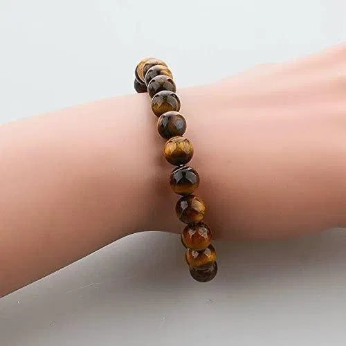 Men's Tiger Eye Yellow Crystal Healing Stone Bracelet featuring polished tiger eye beads on an elastic band.