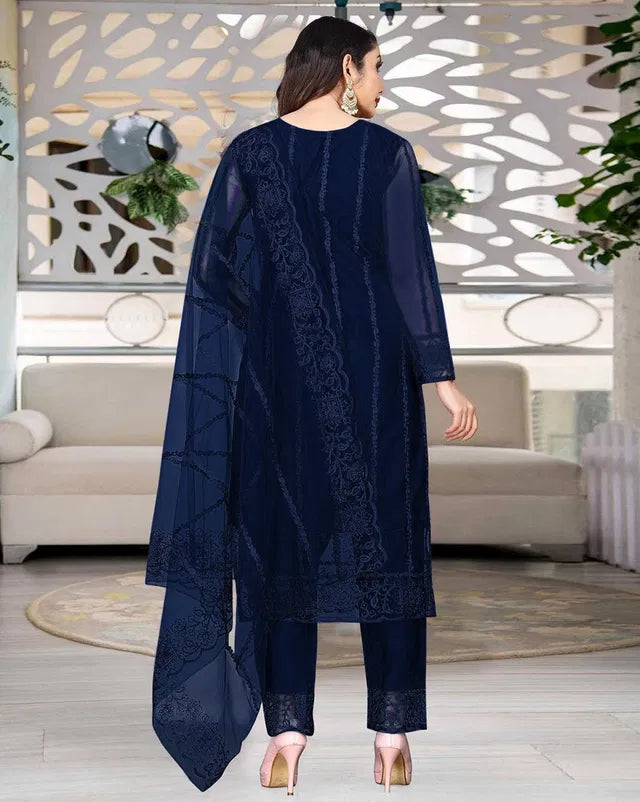 Elegant women's kurta set with matching dupatta and bottomwear from 15801, featuring traditional design and vibrant fabric.