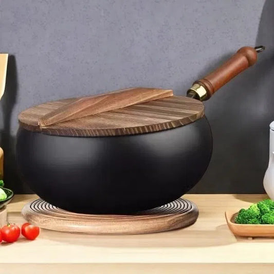 Artisan unenameled cast iron casserole from 25560, used for serving and cooking in a durable, rustic style.