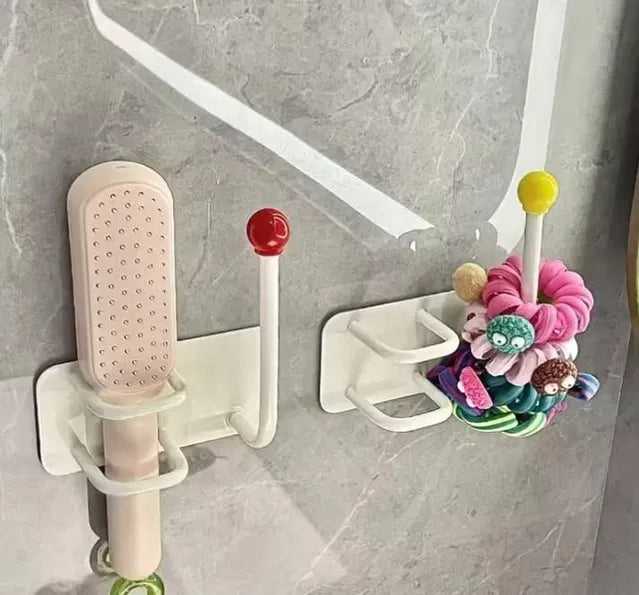 Self-adhesive wall-mounted headband hook by 19357, no drill, punch-free hair accessories organizer, visible on smooth wall.