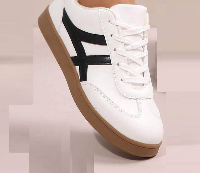 Anjrs 1889 men's casual sports shoes, comfortable running style, black and white design, suitable for boys and men.