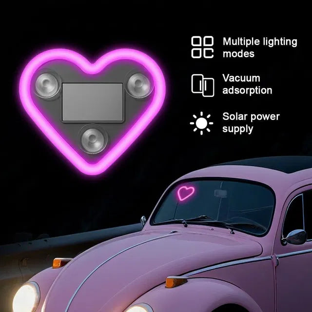 Heart-shaped car window light with suction cups, solar-powered cycle light and reflector from brand 34141, visible on car window.