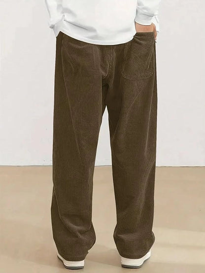Boys corduroy casual pants by 25976 with loose fit wide leg design, elastic waistband, and drawstring for comfortable wear.