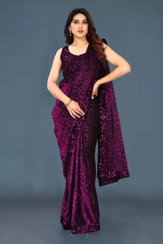Purple lycra blend solid women's saree with intricate border, draped on a mannequin, 6.3 meters in length, from brand 6706.