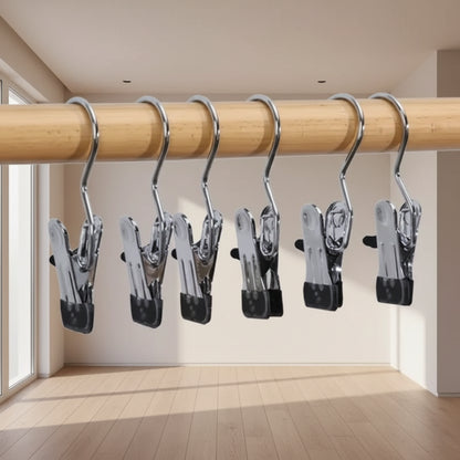 Set of 10 stainless steel cloth hangers with clips from 35561, ideal for organizing clothes and accessories.