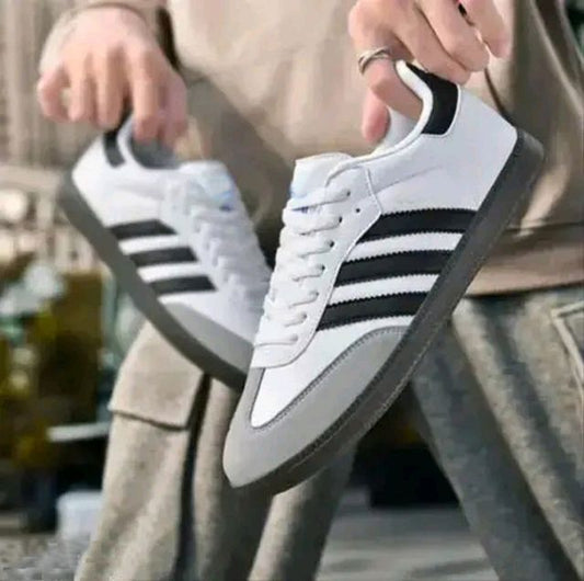 Anjrs Men's Casual Shoes by 1889, stylish and comfortable running and casual shoes for boys and men, shown in a natural pose.