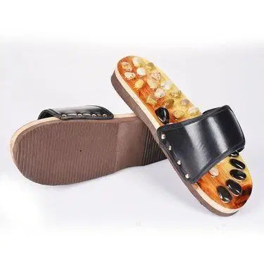 Red acupressure natural stone slippers by 1238 with textured soles designed for foot massage and comfort.