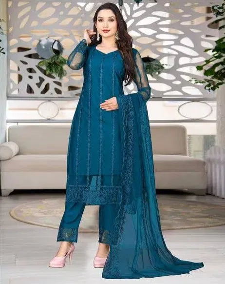 Elegant women's kurta set with matching dupatta and bottomwear, featuring intricate embroidery and vibrant colors.