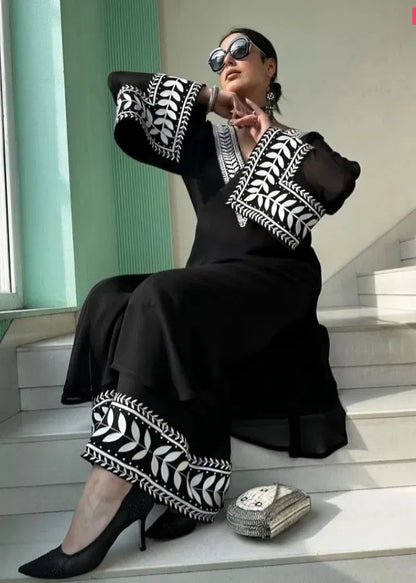 Elegant women's kurta with matching bottomwear from 15801, featuring traditional design and comfortable fit.