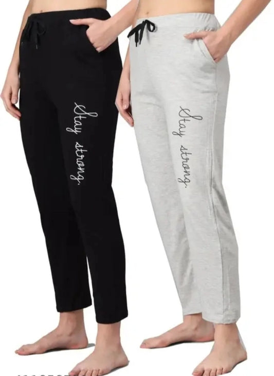 Black and grey cotton blend straight fit women's trousers, size M, shown folded with visible waistband and fabric texture.