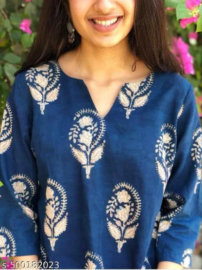 Colorful block print women's kurti with intricate patterns, stylish and trendy fashion piece from 13374 brand.