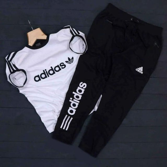 Men's Adidas summer tracksuit in white and black, casual athletic tracksuit with zip-up top and matching pants, front view.
