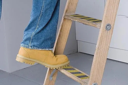 Yellow and black anti-slip tape 5cm by 5m, adhesive safety tape from 25544 with textured surface for grip.