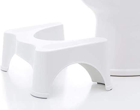 Comfortable white squat stool for western toilets, with a toilet seat cover, designed for ergonomic support and easy use.