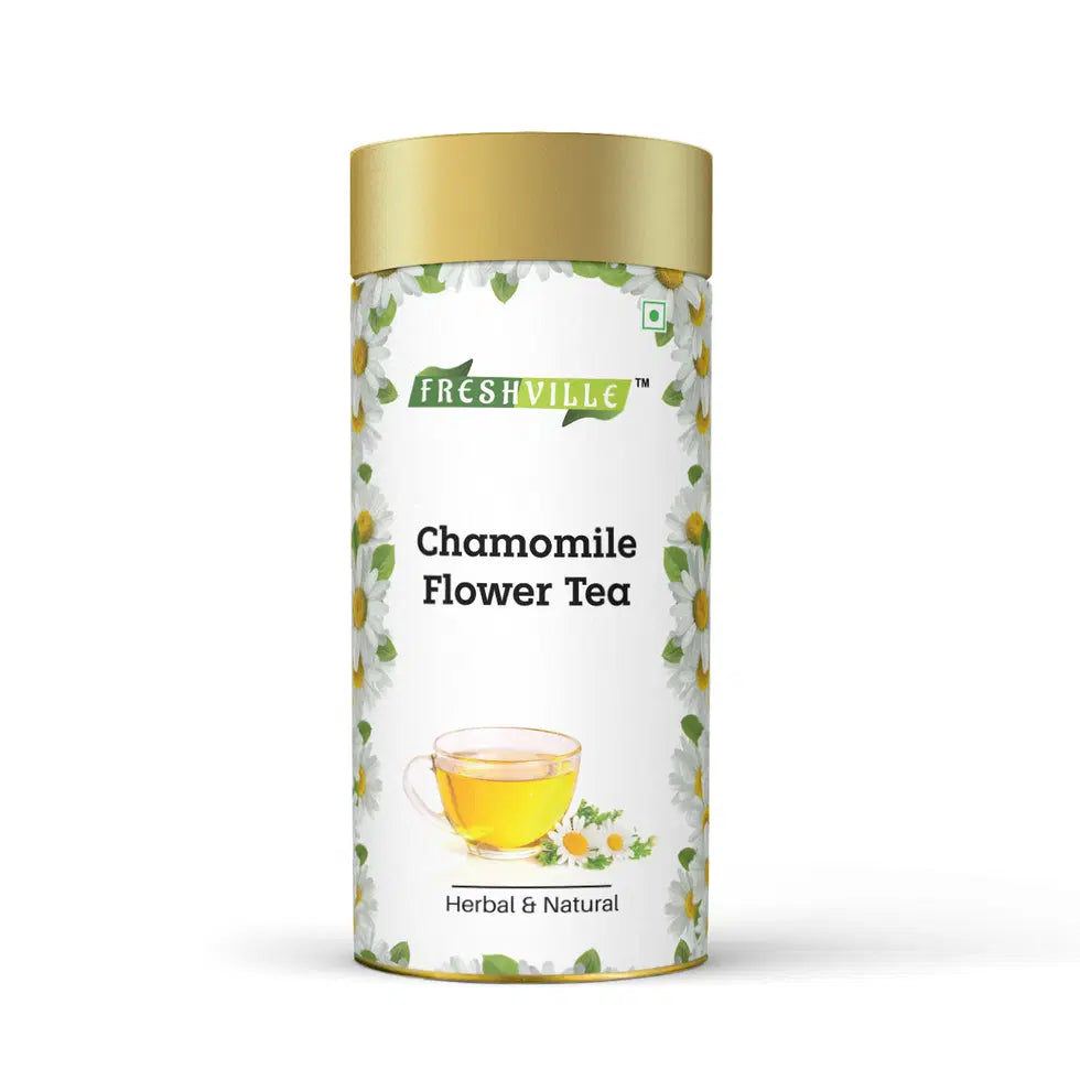 Freshville chamomile tea served in an elegant tea pot, showcasing a cozy tea setting with chamomile flowers.