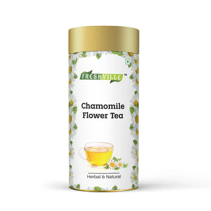 Freshville chamomile tea served in an elegant tea pot, showcasing a cozy tea setting with chamomile flowers.