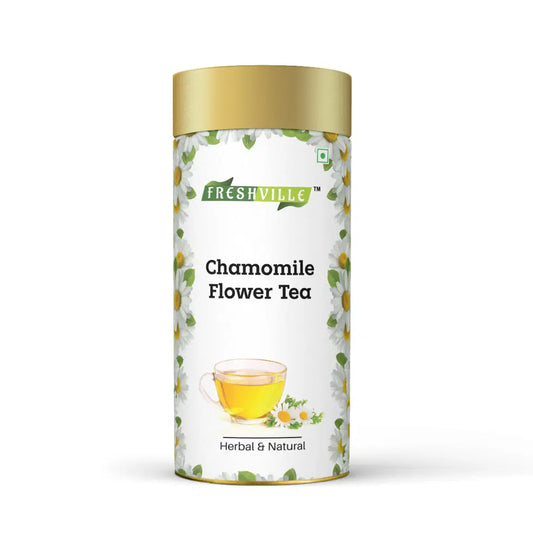 Freshville chamomile tea served in an elegant tea pot, showcasing a cozy tea setting with chamomile flowers.