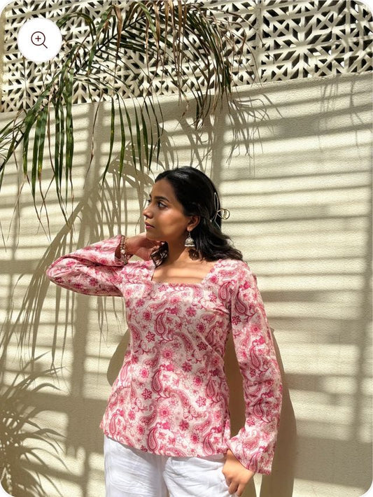 Pink and white printed sleeveless straight kurti for women and girls, featuring a square neck and flared design, by 13374.