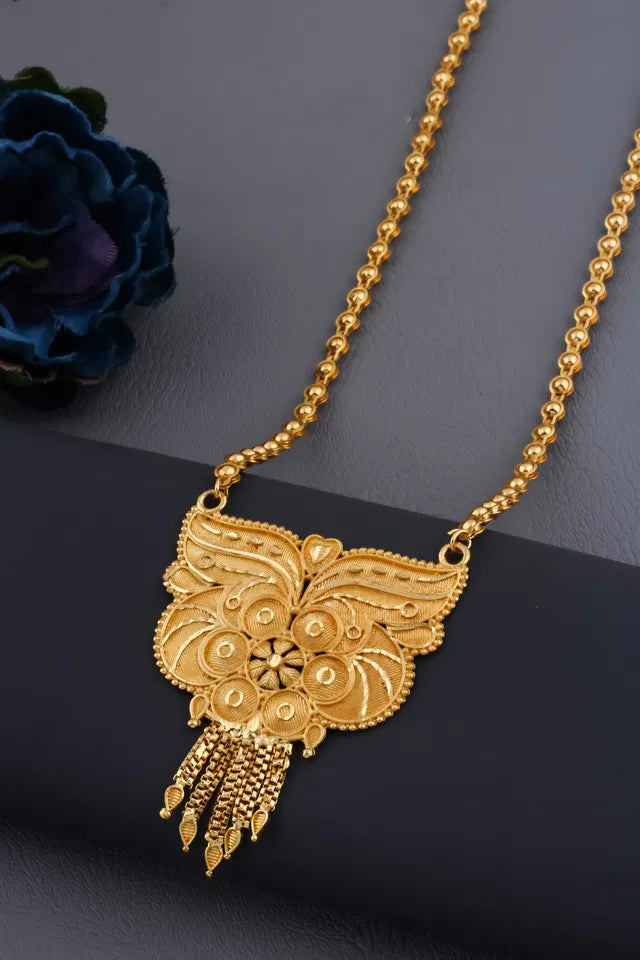 Traditional gold-plated Ki Mala design with moti beads, long mangalsutra for women, featuring intricate chain and pendant details.