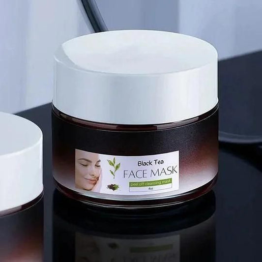 Black tea face mask in a 100g jar from 18058, a soothing cream for skincare and facial treatment.