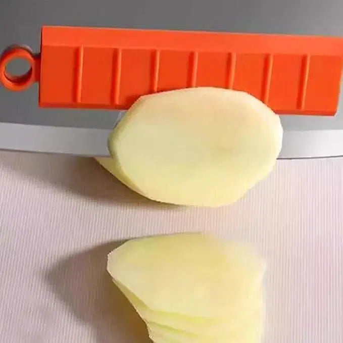 Two silicone magnetic vegetable choppers from 1238, compact manual kitchen tools with stainless steel blades for easy vegetable chopping.