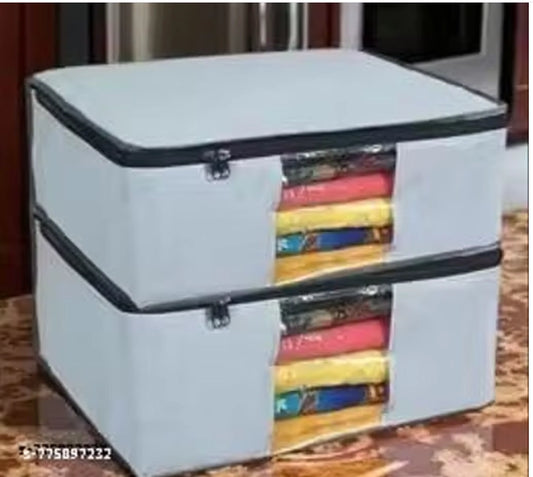 Two transparent cloth wardrobe covers with zippers, designed for sarees and clothes storage, featuring clear windows for easy identification.