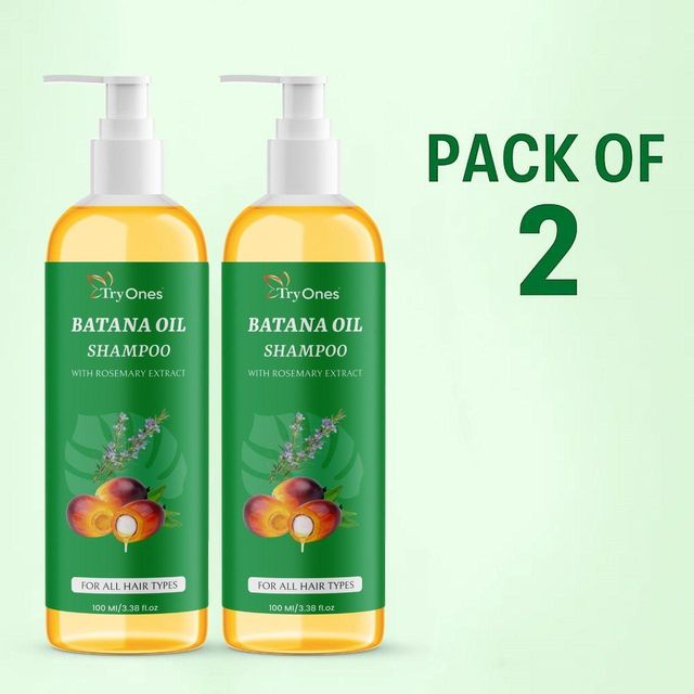 Pack of two 18058 Batana Oil Shampoo bottles, creamy formula for nourishing hair, in clear containers with pump dispensers.