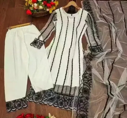 Elegant women's kurta set with matching dupatta and bottomwear from 15801, featuring intricate embroidery and comfortable fabric.