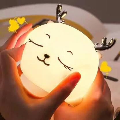 Battery-operated nursery night light by 1238, emitting soft glow, ideal for calming babies in a cozy nursery setting.
