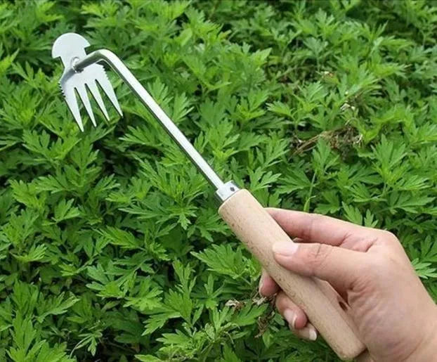 Sharp weeding tool puller from 25560 gardening tools set, featuring a sturdy metal handle and pointed tip for easy weed removal.