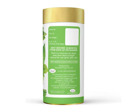 Freshville green tea leaves displayed in a traditional tea pot, showcasing high-quality tea leaves from the 34136 brand.