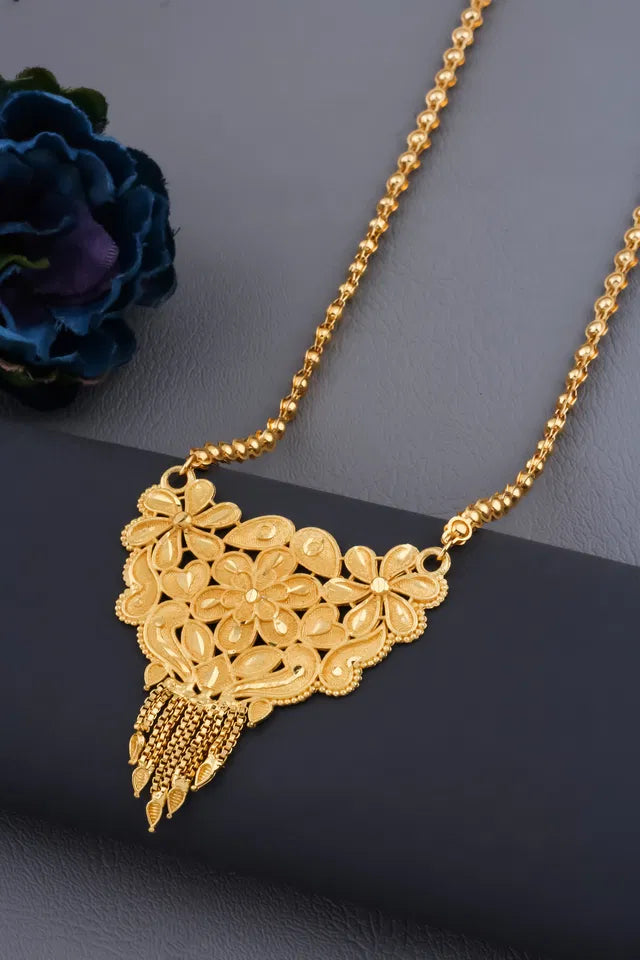 Traditional gold-plated Ki Mala design with moti beads and long chen ladi, elegant women's mangalsutra with intricate detailing.