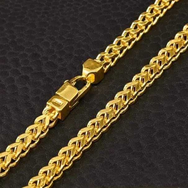 Heavy gold-plated Cuban link chain for men and boys, showing a thick, shiny chain with a secure clasp.