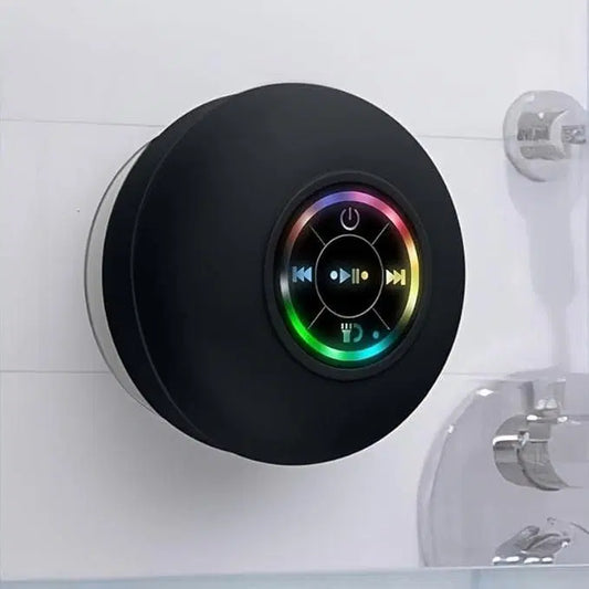 Large waterproof Bluetooth speaker from 1238 with suction cup design, ideal for outdoor or shower use.