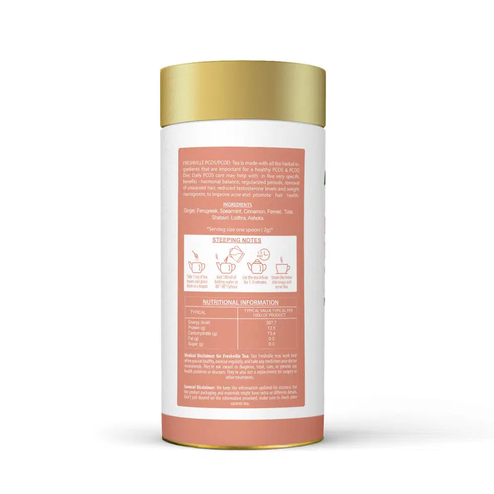 Freshville PCOS PCOD Tea in a clear glass tea pot, showing brewed herbal tea with fresh herbs and tea leaves inside.