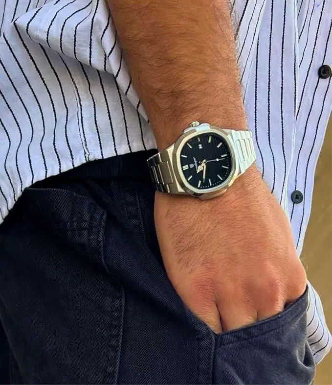 Men's luxury stainless steel analog watch by 1238 featuring a sleek round dial and polished metal band.