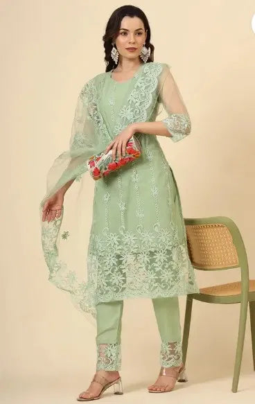 Women's Kurta set with matching dupatta and bottomwear by 15801, featuring traditional embroidery and vibrant fabric details.
